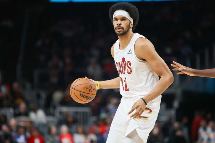 Mar 6, 2024; Atlanta, Georgia, USA; Cleveland Cavaliers center Jarrett Allen (31) handles the ball against the Atlanta Hawks in the first quarter at State Farm Arena.